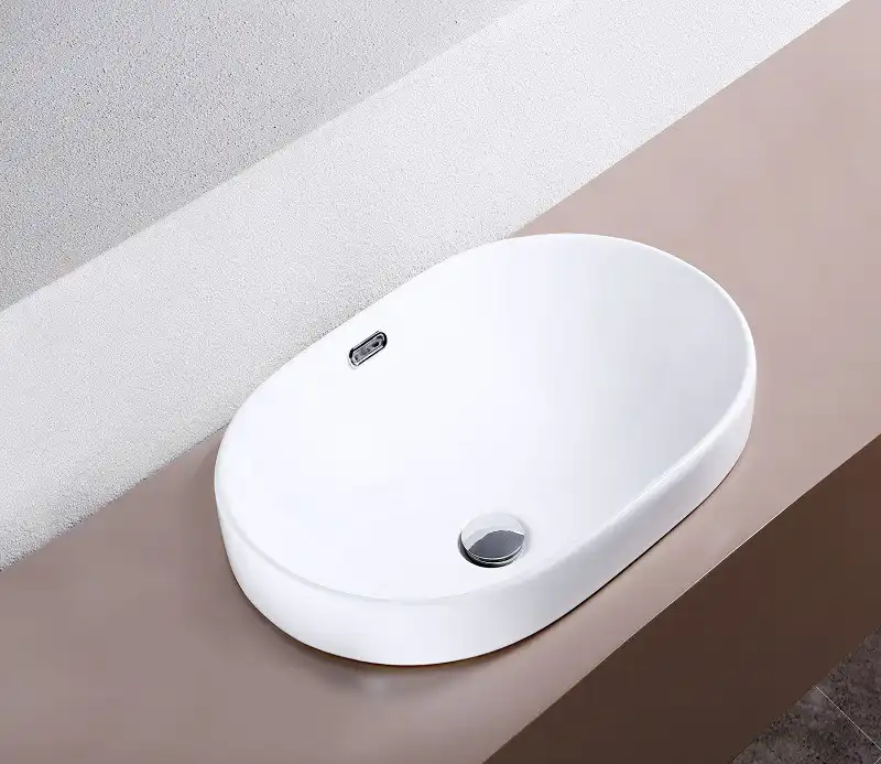 Умывальник CeramaLux 5006C 600х390х170 Полувстраиваемая цвет Белый фото 3