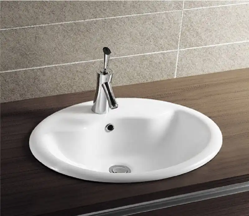 Умывальник CeramaLux 316 570х460х195 Полувстраиваемая цвет Белый фото 1